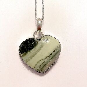 1 inch, heart shaped,  Larsonite pendant on a silver chain